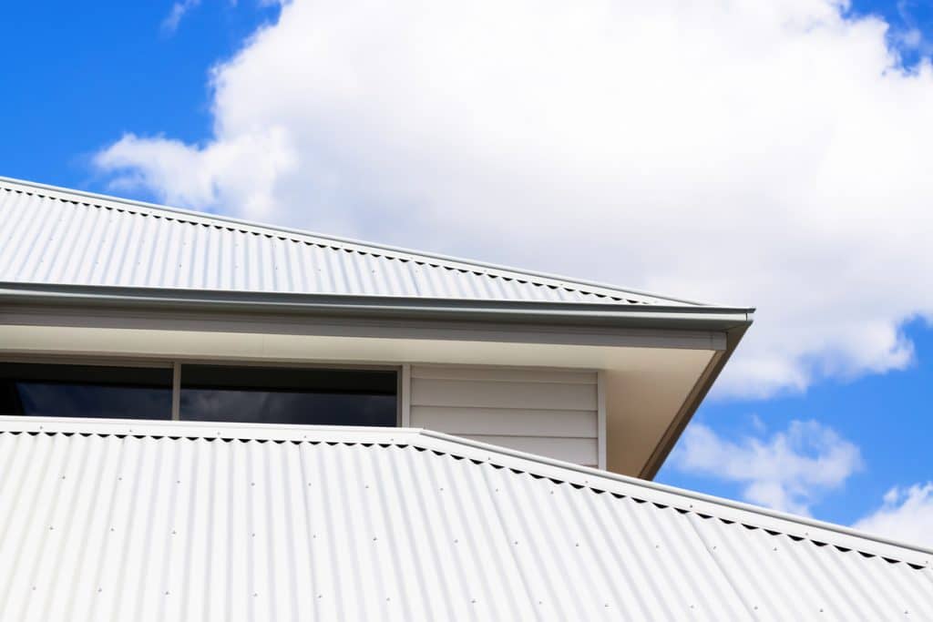 Low angle view of corrugated iron roof, copy space