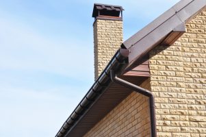 Rain Gutter Corner Repair. Roof Guttering installation with Chimney, Rain Chain Pipe and Holder.